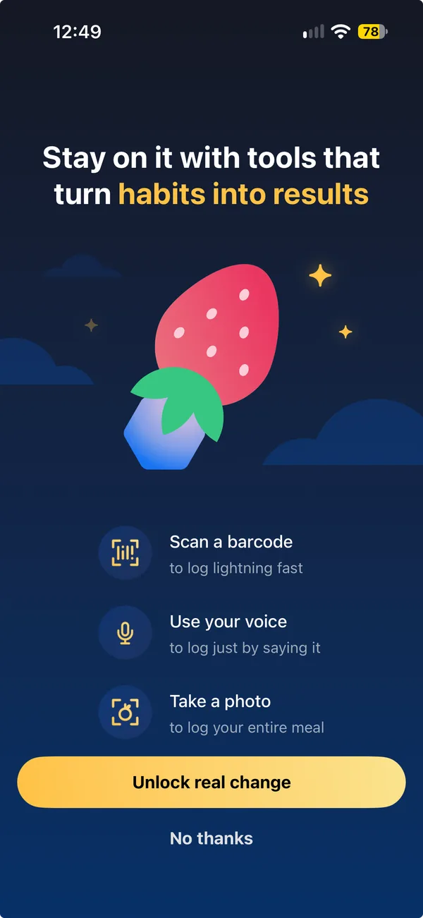 MyFitnessPal's offer to upgrade, on a dark blue screen with a strawberry. It reads Stay on it with tools that turn habits into results, and lists Scan a barcode, Use your voice and Take a photo, with Unlock real change and No thanks.